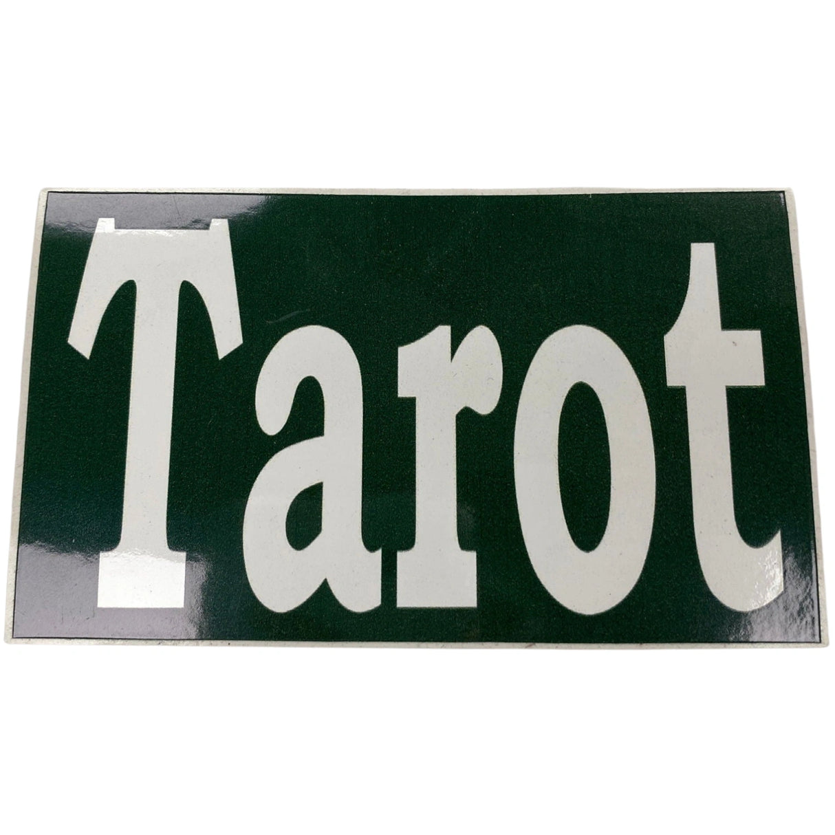 Tarot sticker, green background with white text.