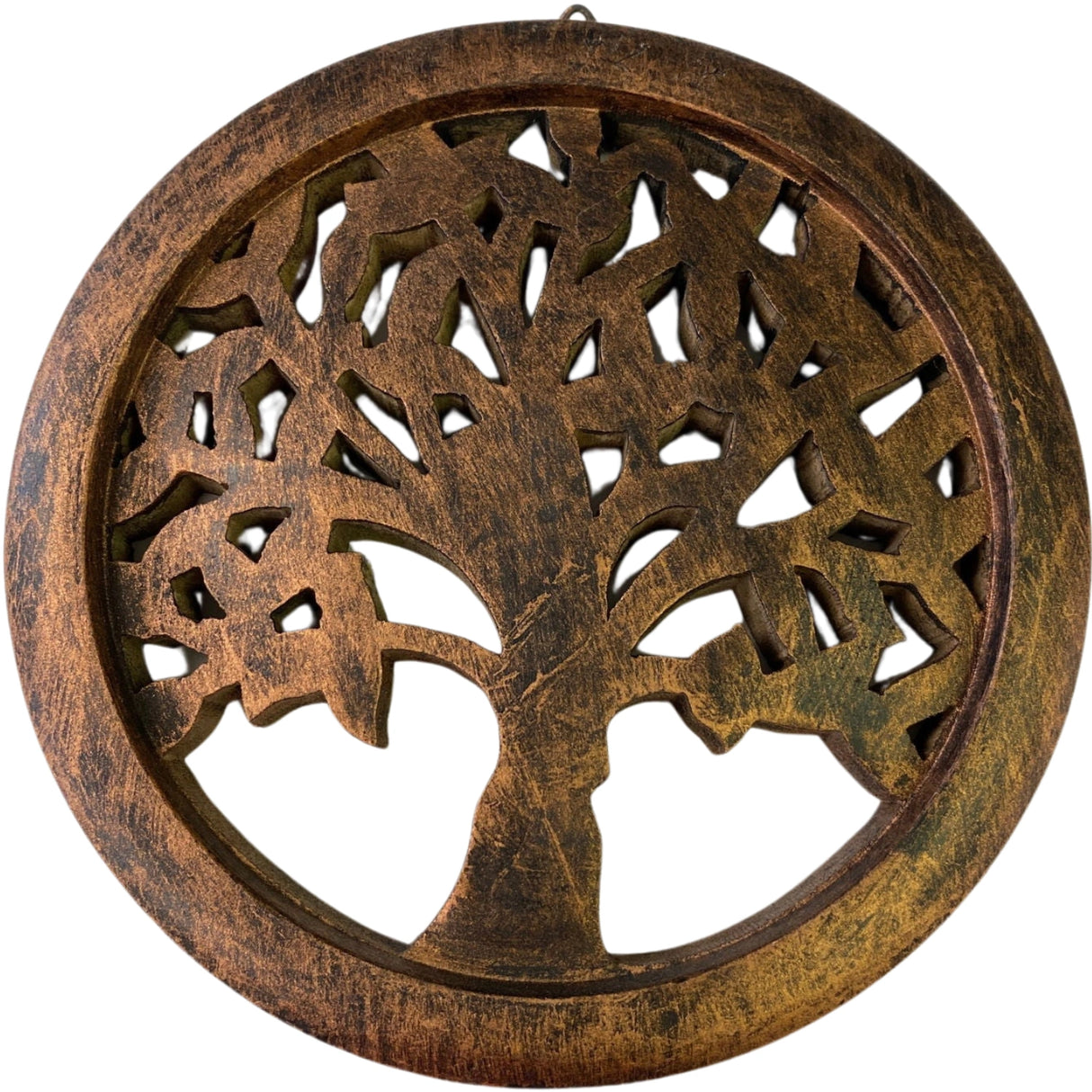 Circular wooden wall hanging with a detailed tree of life design.