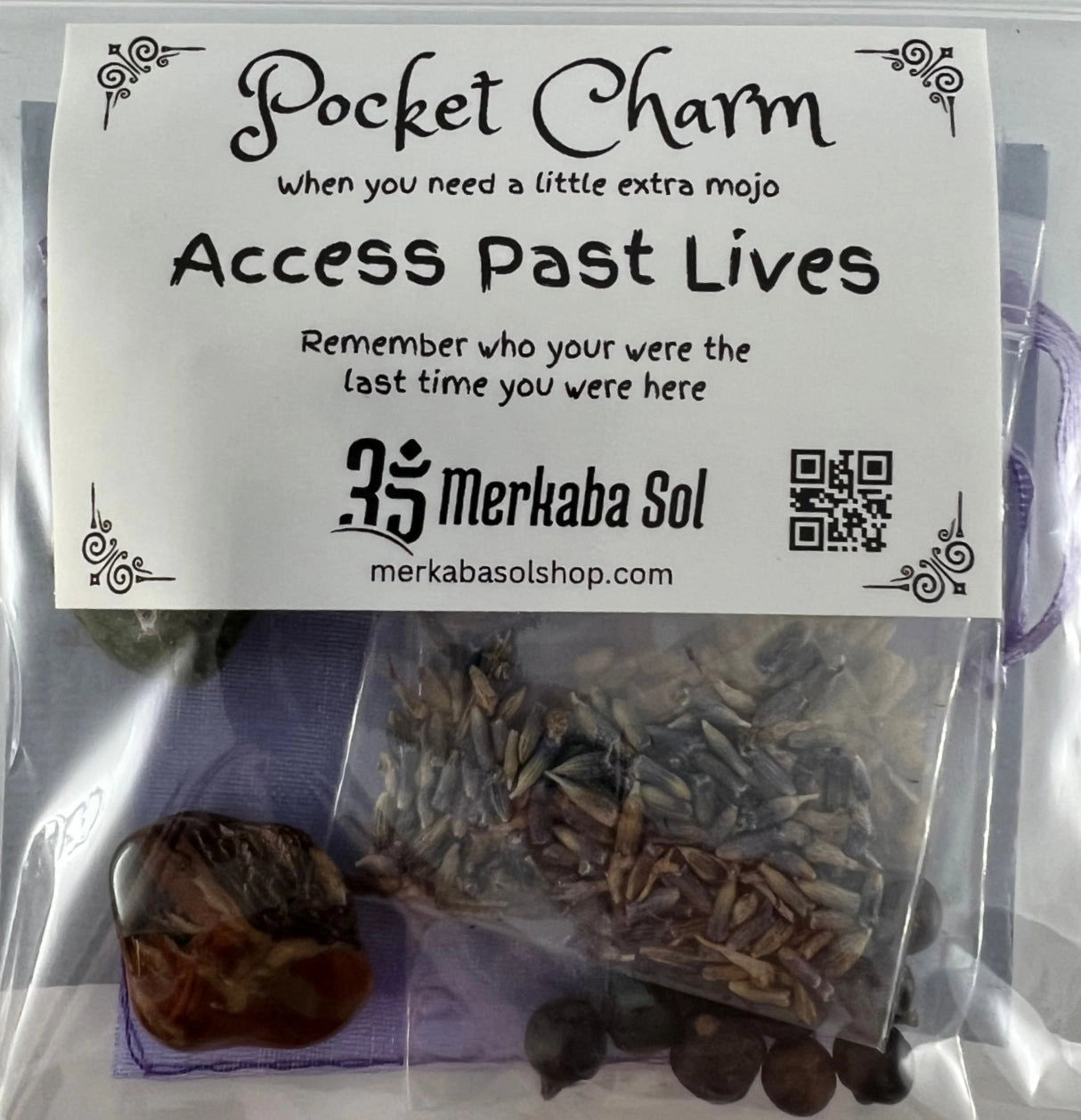 Unlocking Past Lives Pocket Charm Kit with Transparent packaging, White label, and Black text.