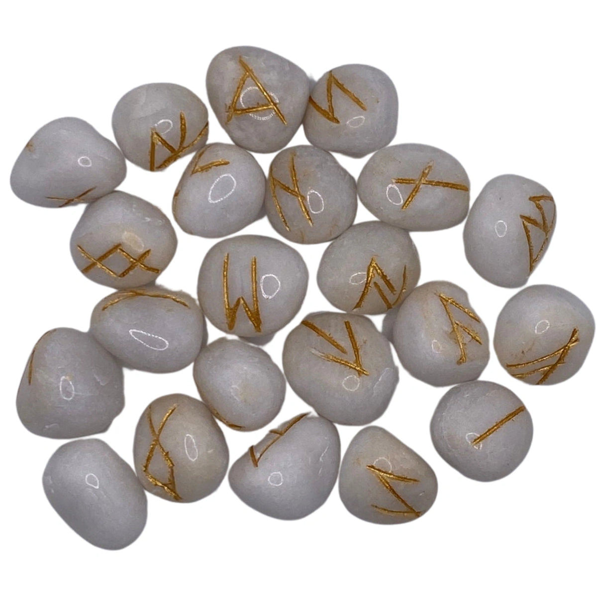 White onyx stones with gold runes engraved on them.