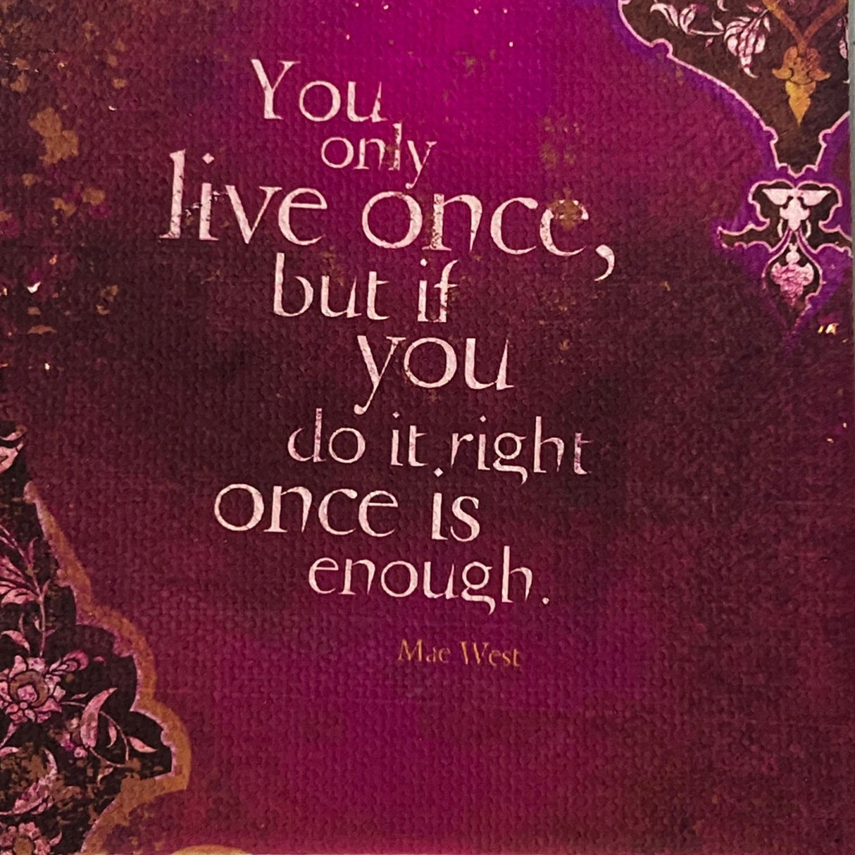 You Only Live Once Canvas Magnet with a quote by Mae West on a purple background with floral patterns. The quote reads: "You only live once, but if you do it right, once is enough."
