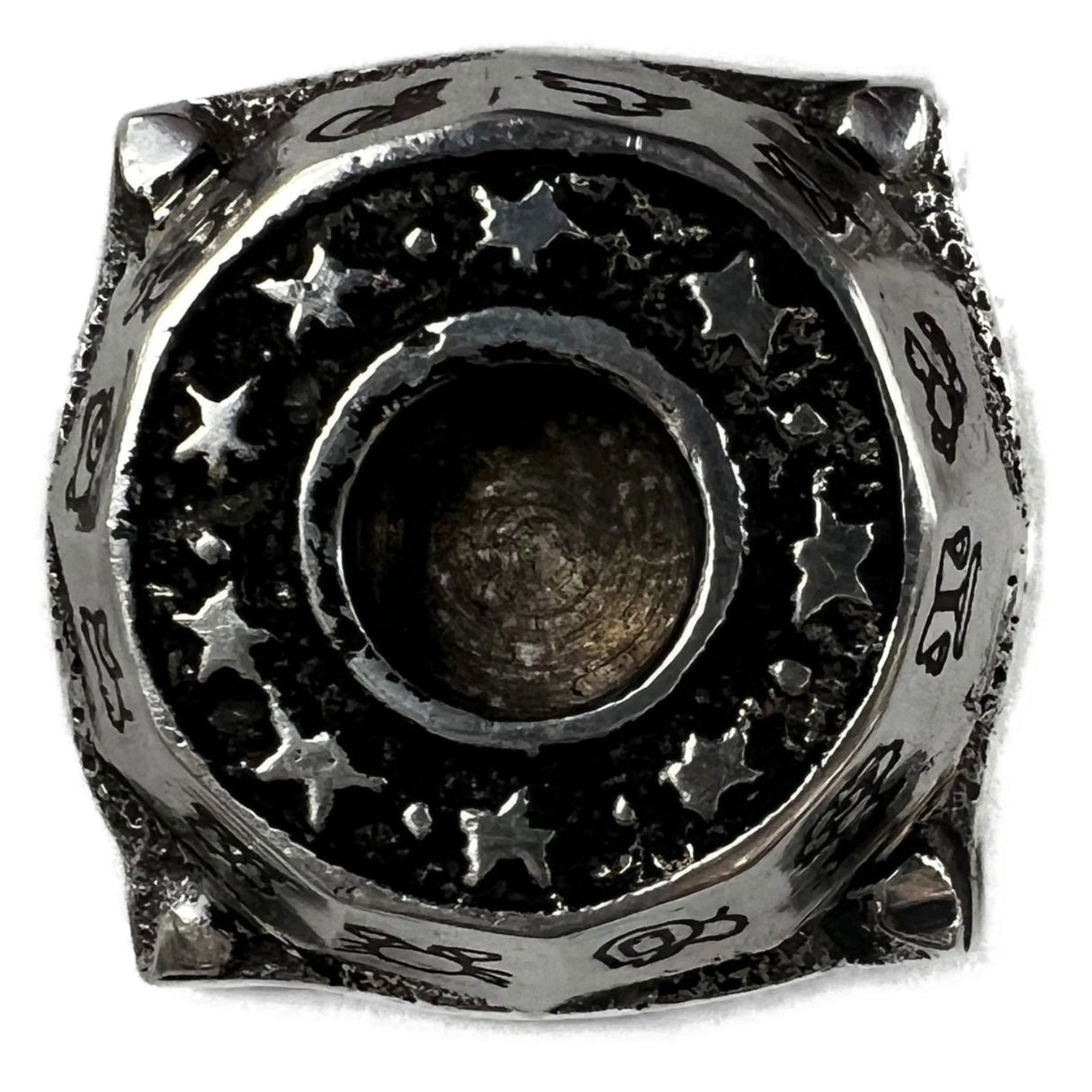 Zodiac Aluminum Ritual Candle Holder - top of candle holder with stars surrounding the hole