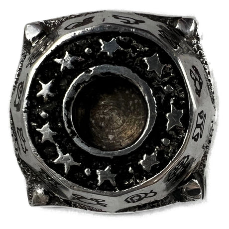 Zodiac Aluminum Ritual Candle Holder - top of candle holder with stars surrounding the hole