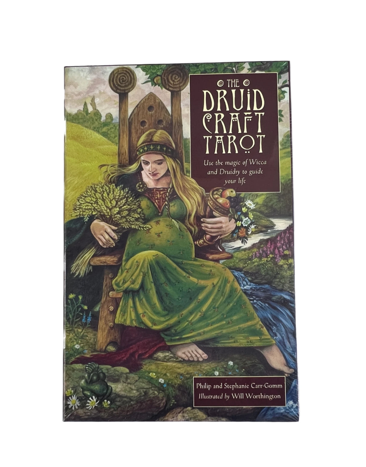 druid craft tarot in large green box with image of woman sitting in chair