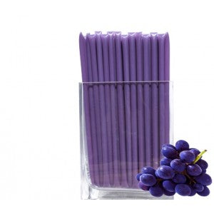Grape Honey Straw.  A clear, plastic straw heat sealed at each end holding a purple, grape honey syrup within. 