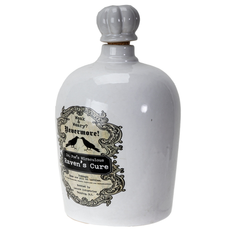 A white ceramic bottle with a gray ribbed stopper, featuring a vintage-style label for 'Ravenmore' 'Raven's Cure' with black raven silhouettes and ornate detailing.