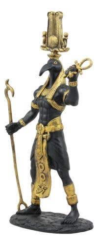 Statue of an Egyptian deity with a white background