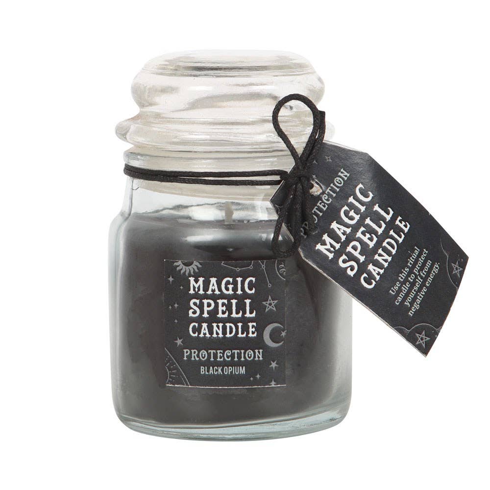 Glass jar with a black spell candle labeled 'Magic Spell Candle Protection' on a white background
