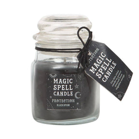 Glass jar with a black spell candle labeled 'Magic Spell Candle Protection' on a white background