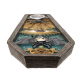 A coffin-shaped decorative box with a dark wood-grain frame and a gothic-themed interior featuring black spiders, gold web motifs, and a central skull detail, shown on a plain white background.