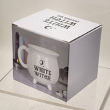 White mug with 'White Witch' text in a box packaging.