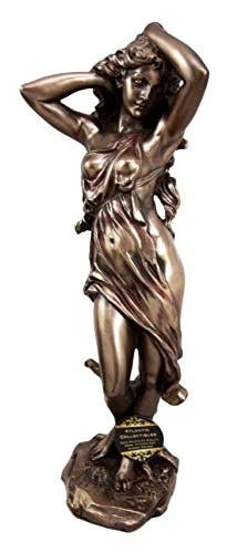 Bronze statue of a woman with a draped garment on a white background