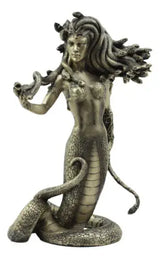 Bronze statue of a mythical creature with snake-like body and lion's head on a white background
