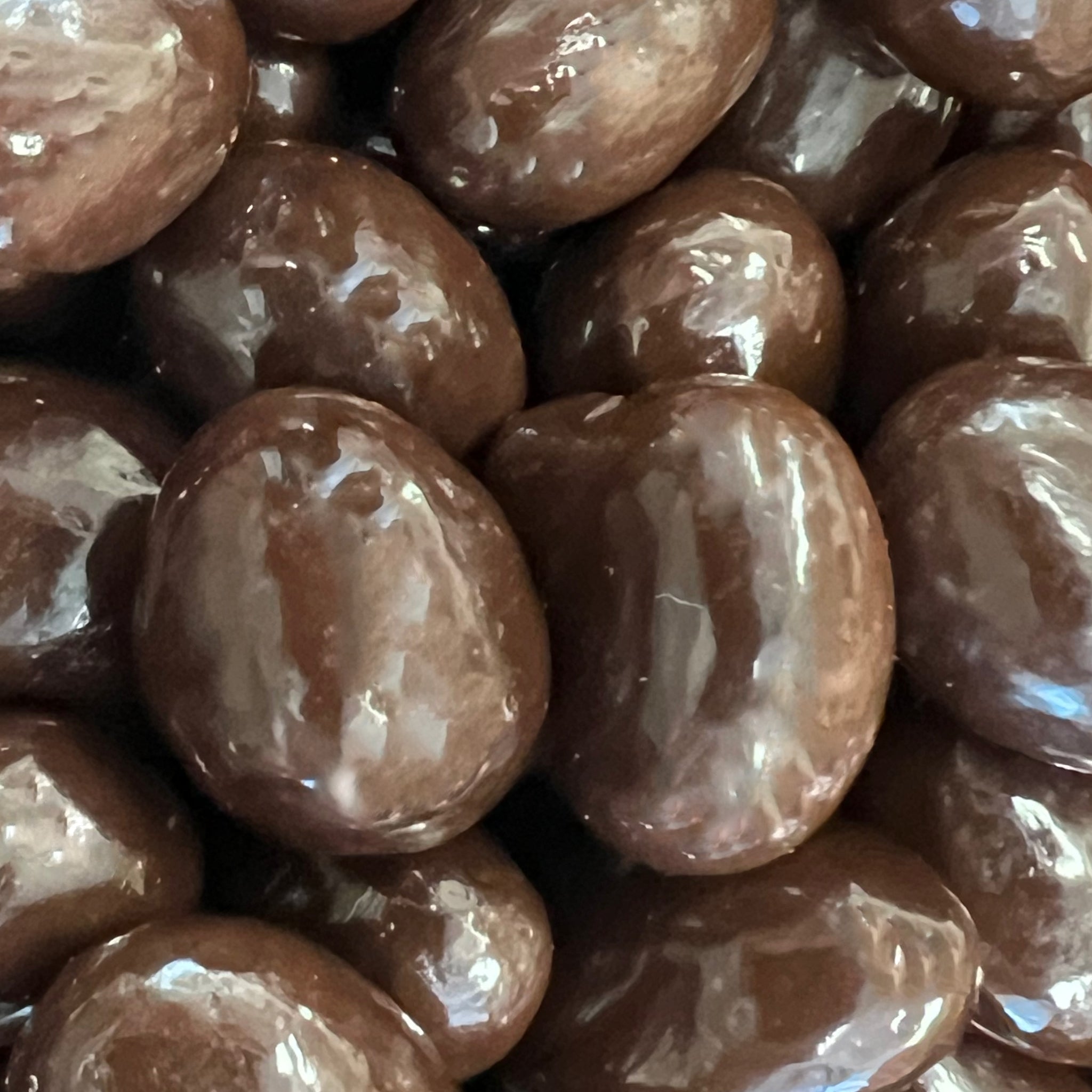 Dark chocolate covered almonds 72%