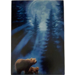 Two bear cubs walking with their mother in a forest under a bright full moon.