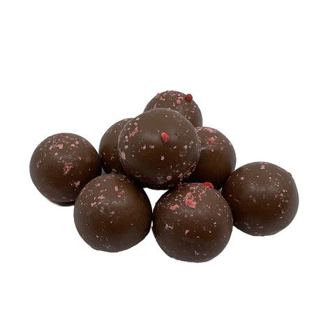 Black Forest Milk Chocolate Truffle - Black Forest Milk Chocolate Truffle.  Round cherry milk chocolate with red sprinkles.