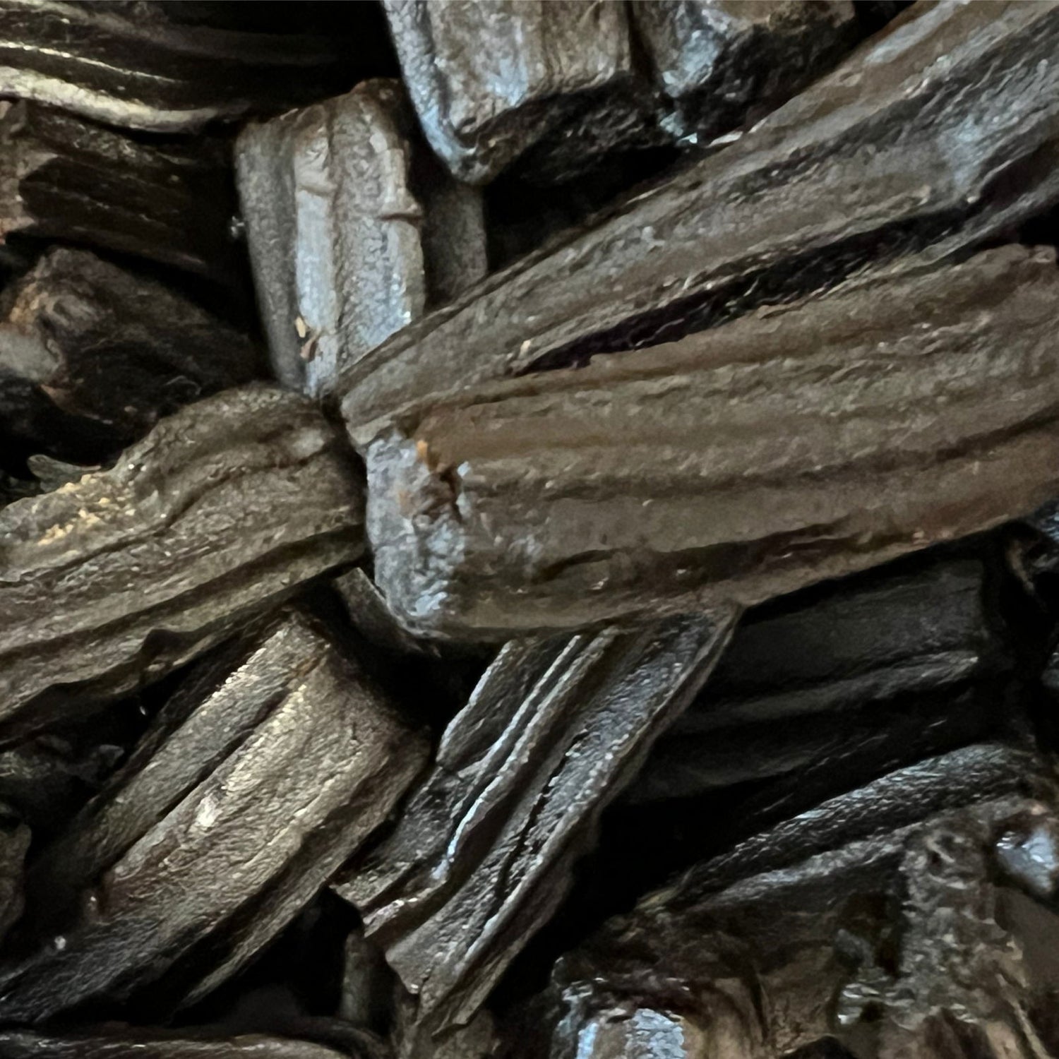 Black Liquorice - Black Liquorice. Black 1 inch licorice pieces with ridges.  