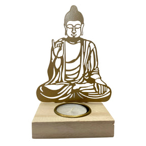 White ceramic candle holder shaped like a Buddha figure.