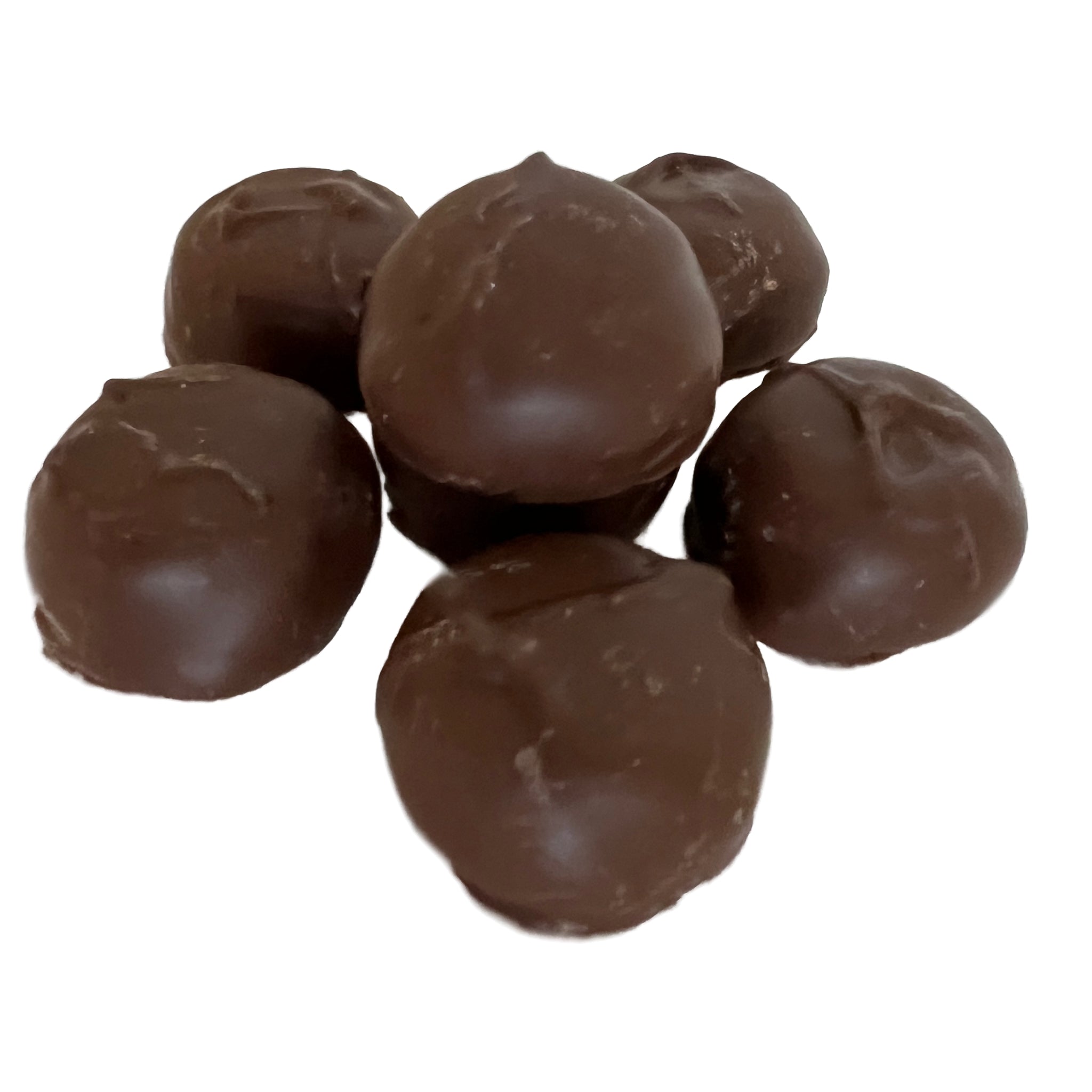 Round milk chocolate candies with marshmallow and caramel inside 
