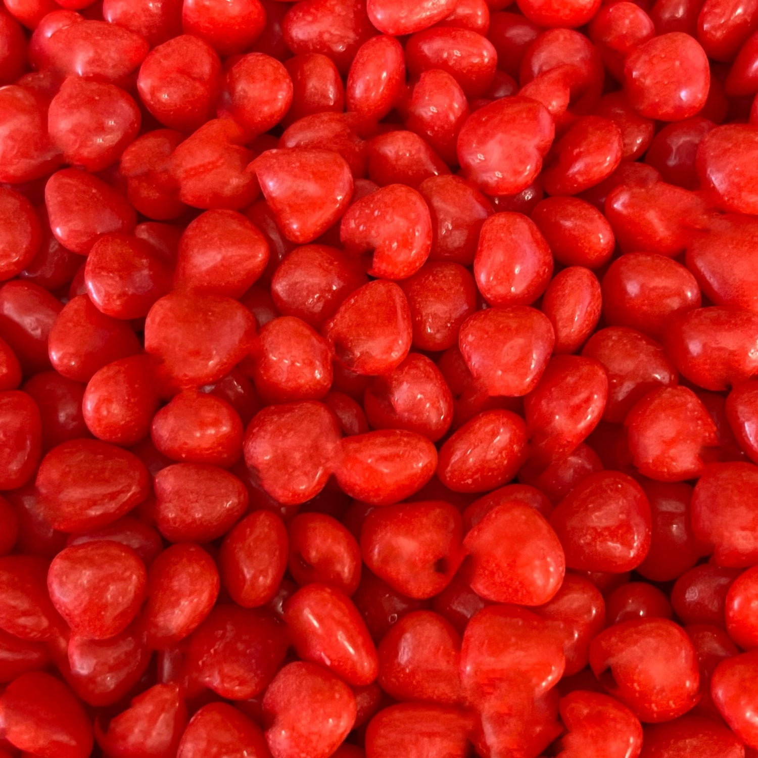 Cinnamon Imperials - Cinnamon Imperials.  They are small, red, hard but chewy candies with spicy cinnamon flavor.