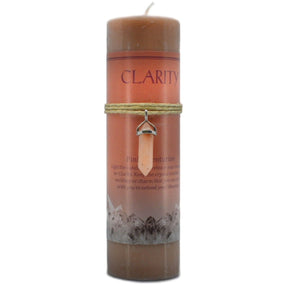 Pink candle with "CLARITY" label and pink aventurine pendant.