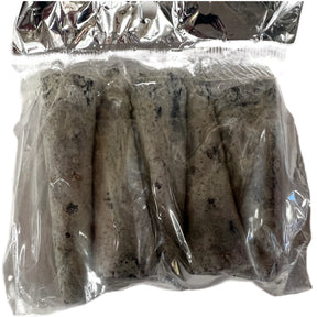 Copal incense cones in a clear plastic bag.