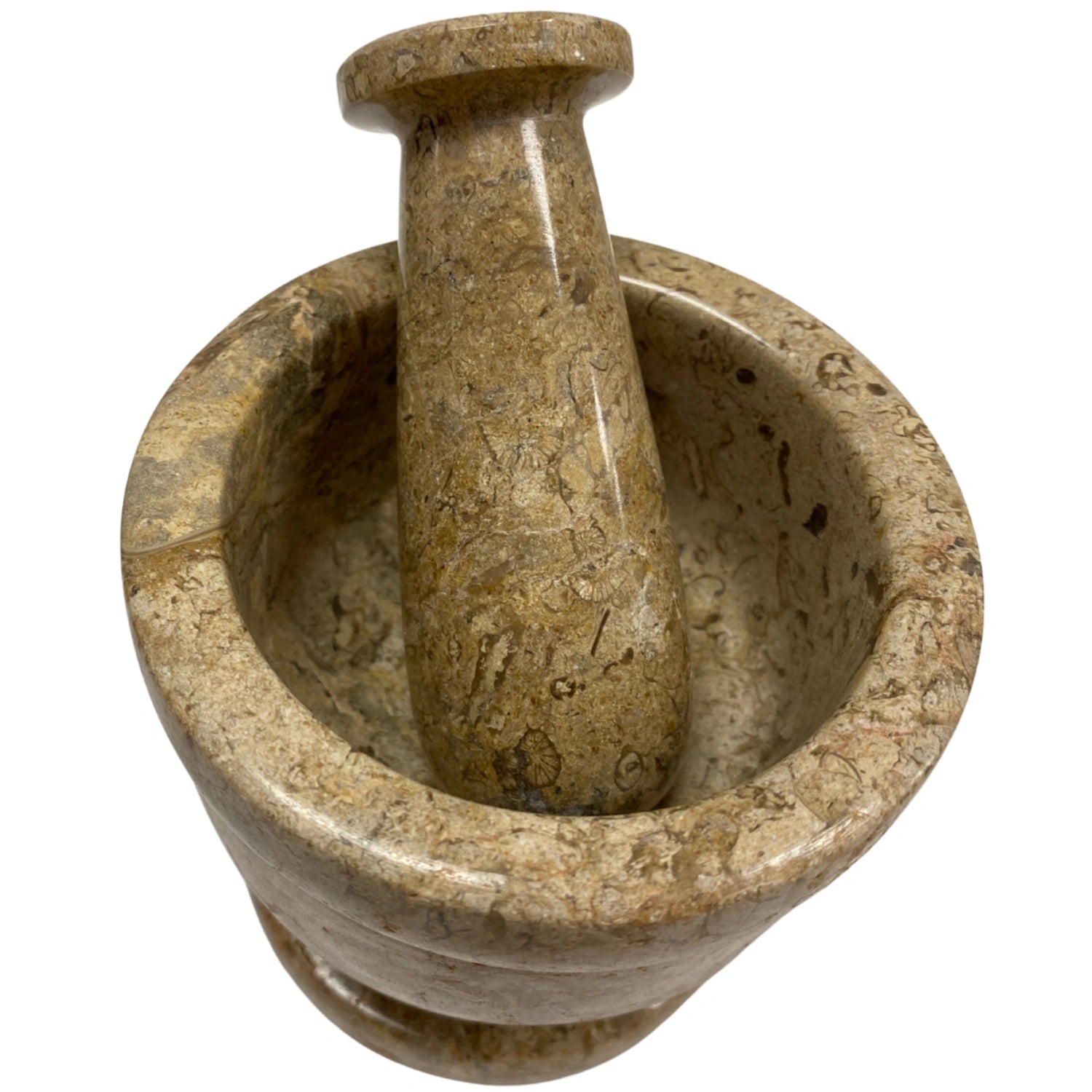 Brown marble mortar and pestle set with fossilized coral inclusions.