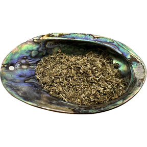 Dried Damiana Leaf in an abalone shell.