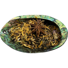 Dried Dark Days Tea in an abalone shell.