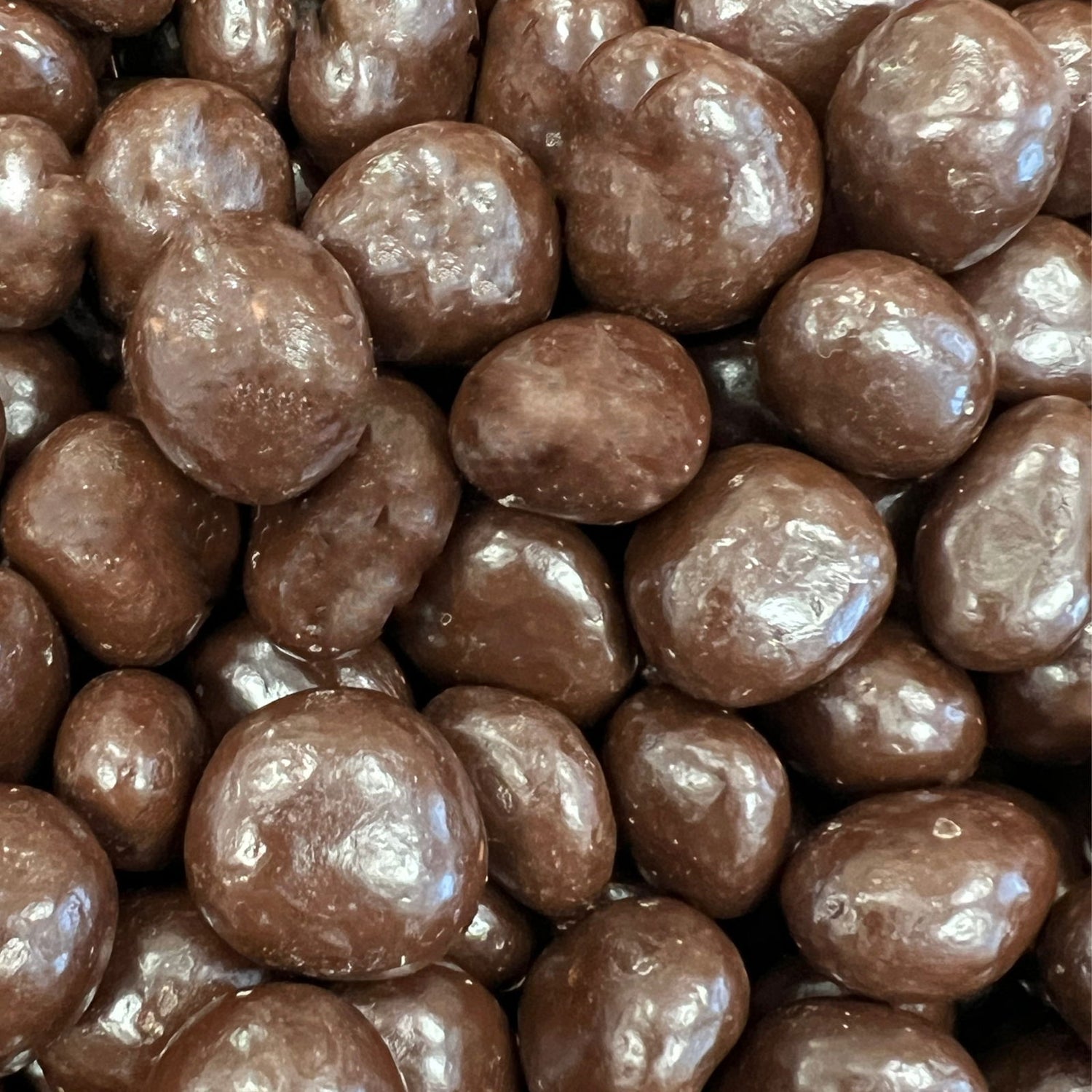 Dark Chocolate Covered Strawberries - roundish  chocolate pieces of chocolate covered strawberries 