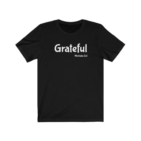 Grateful Short Sleeve Tee - Share how grateful you are with this t-shirt. Bring inspiration and empowerment to your wardrobe with this Grateful t-shirt in black color or give it as a fun gift. From merkabasolshop.com