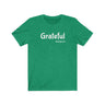 Grateful Short Sleeve Tee - Share how grateful you are with this t-shirt. Bring inspiration and empowerment to your wardrobe with this Grateful t-shirt in kelly green color or give it as a fun gift. From merkabasolshop.com