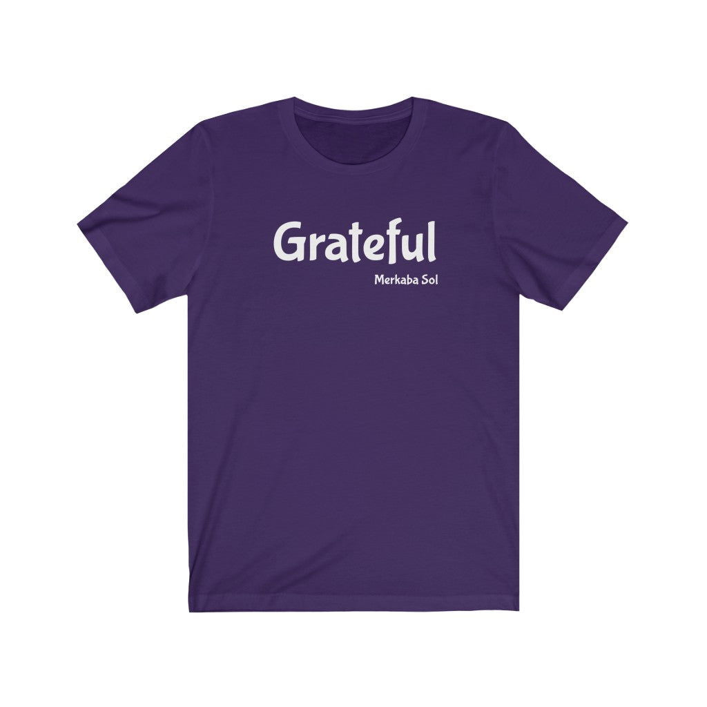 Grateful Short Sleeve Tee - Share how grateful you are with this t-shirt. Bring inspiration and empowerment to your wardrobe with this Grateful t-shirt in purple color or give it as a fun gift. From merkabasolshop.com