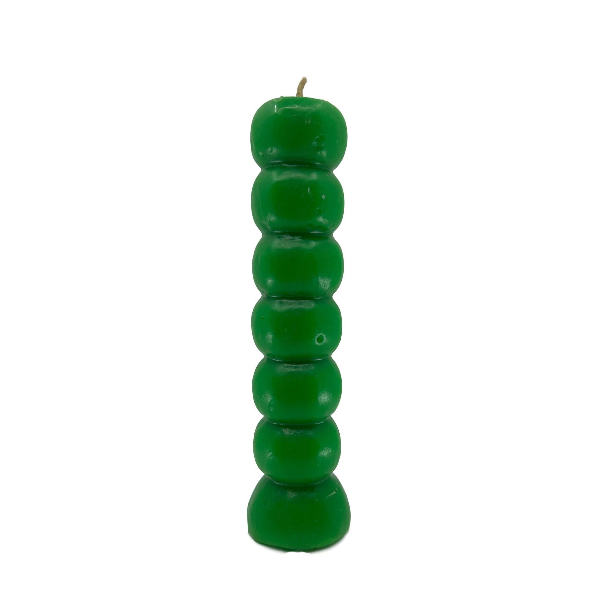 green, tall pillar candle with 7 marking knobs 