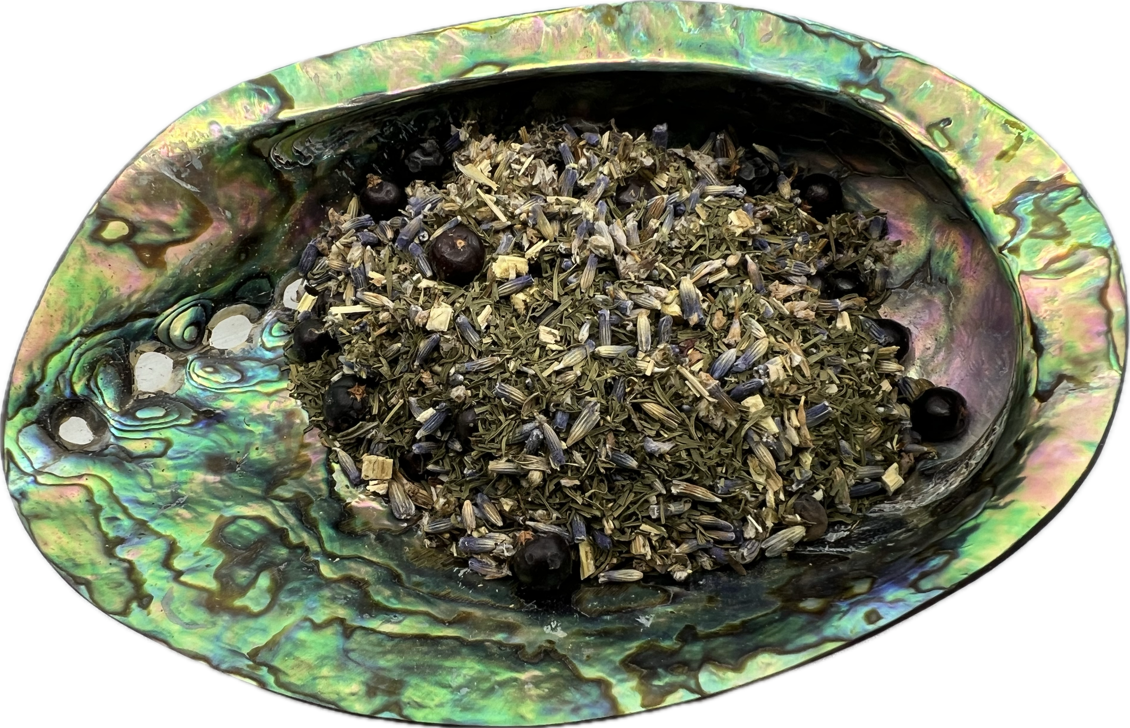 a mix of dried herbs in a shell bowl 