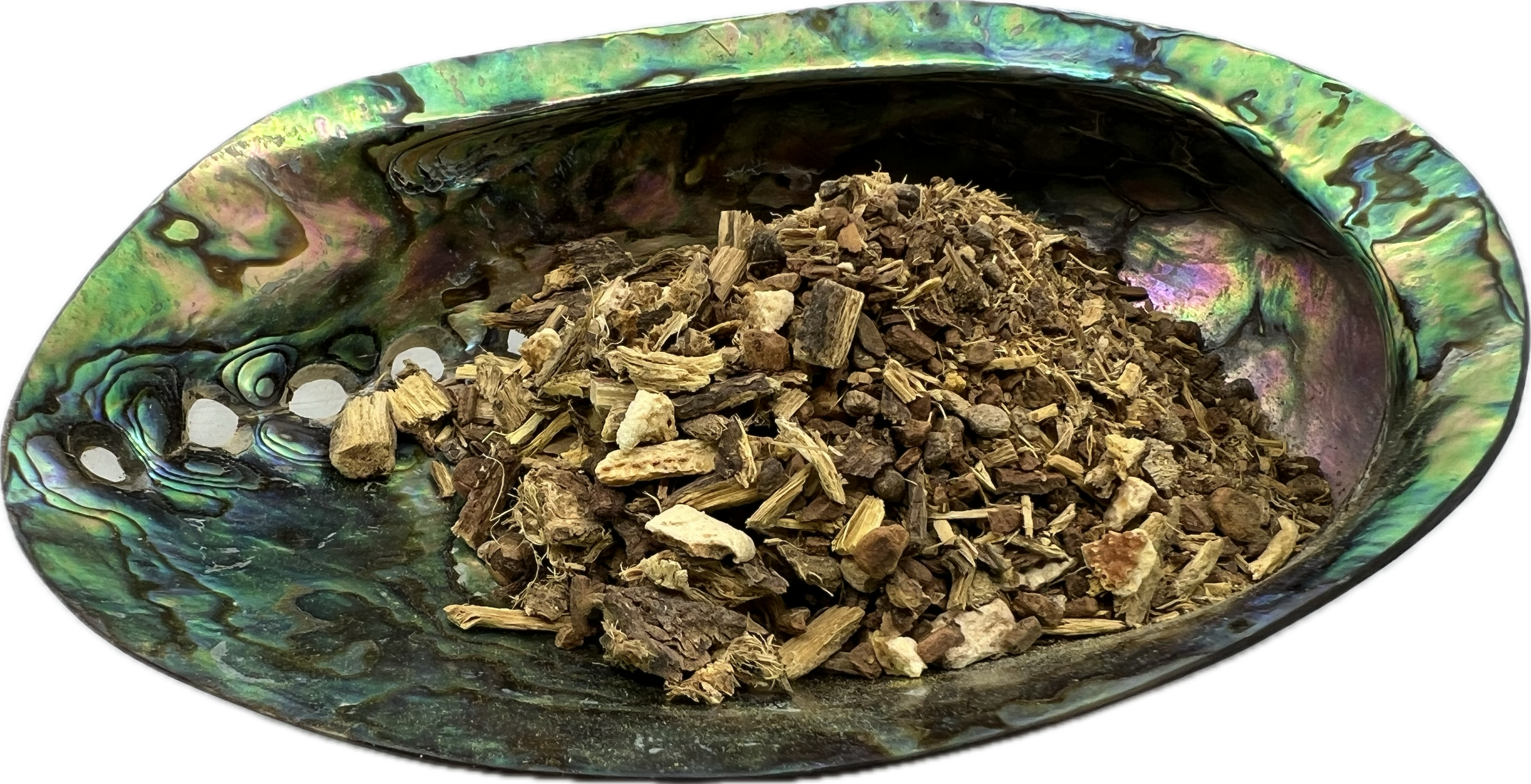 a lix of dried herbs in a shell bowl 
