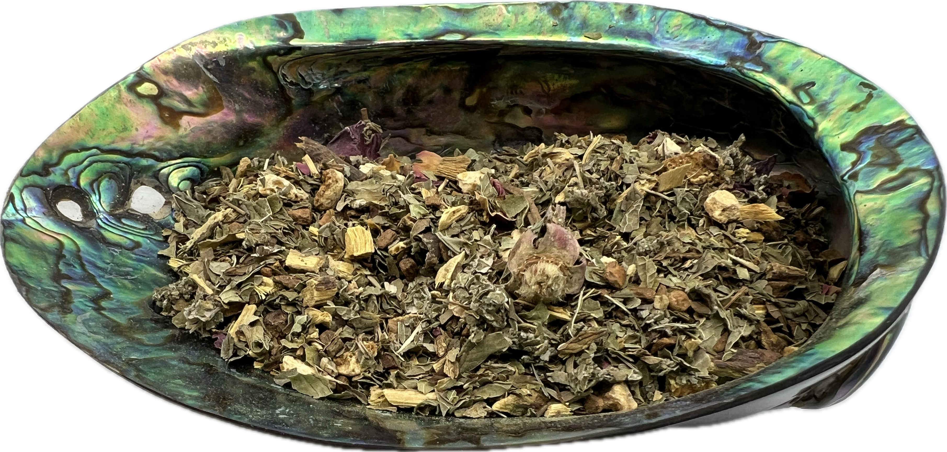 a mix of dried herbs in a shell bowl 