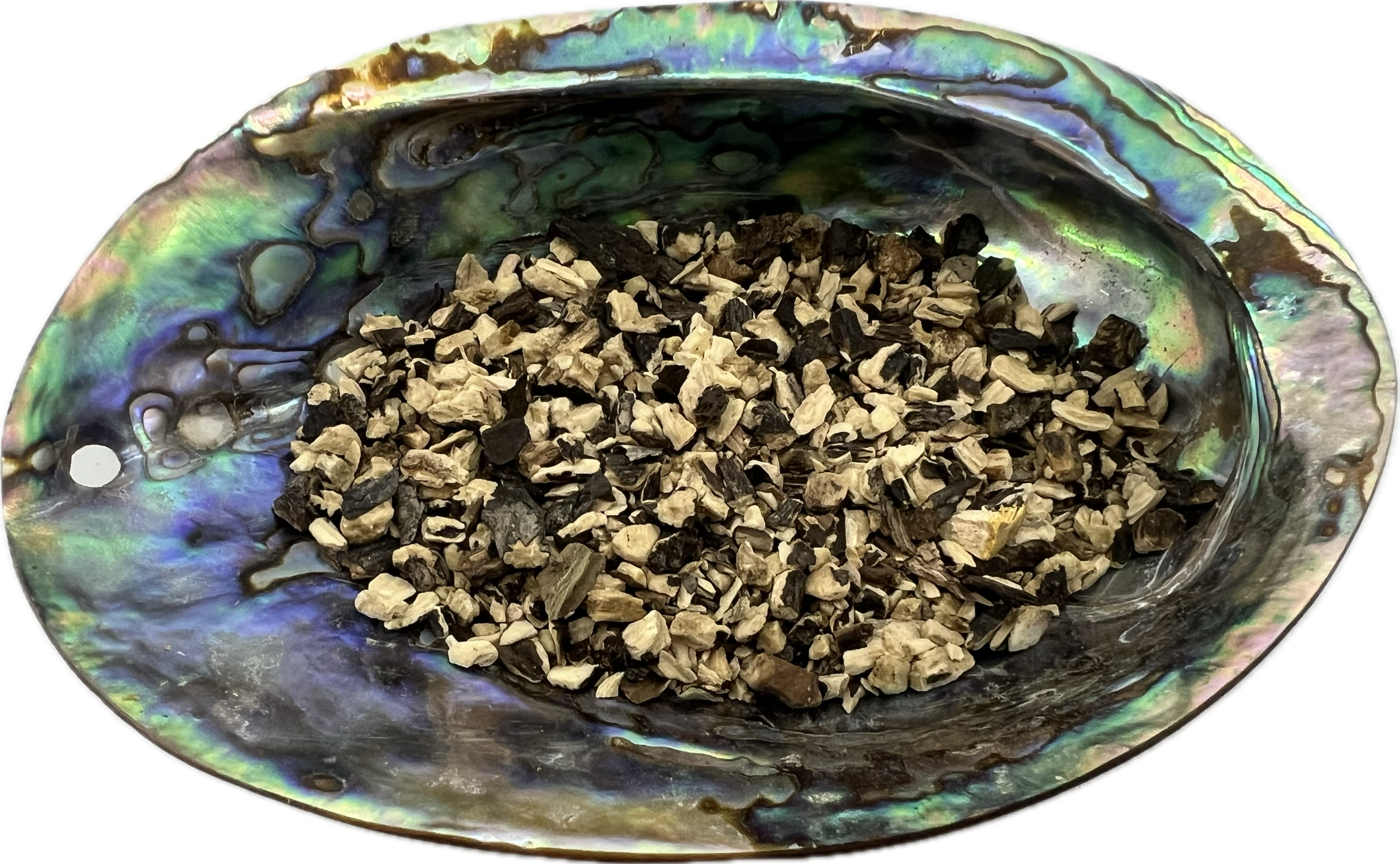 dried herbs in a shell bowl 