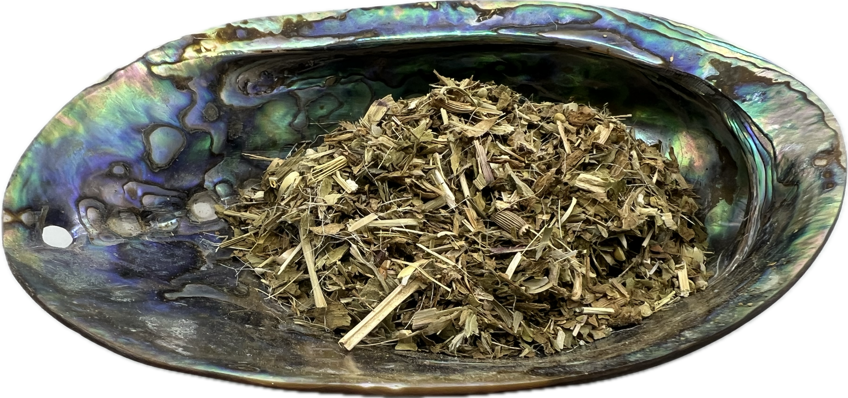 a mix of dried herbs in shell bowk 