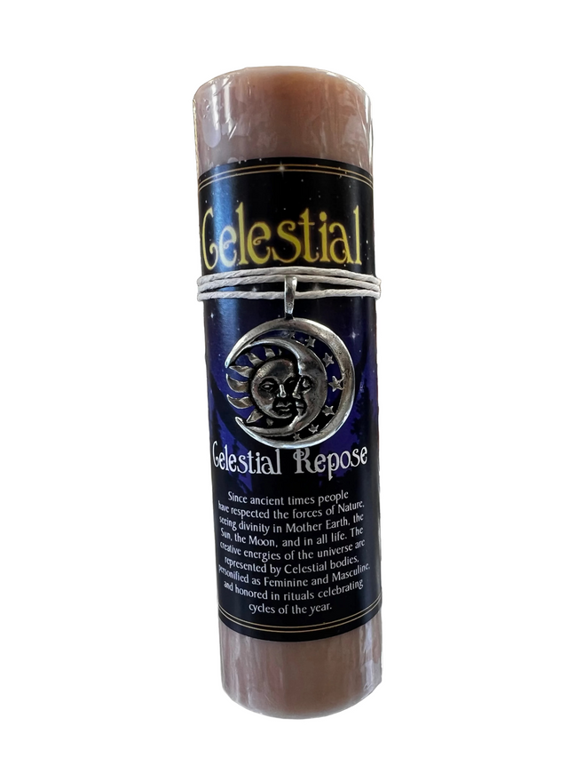 Tan colored pillar candle with writing 
