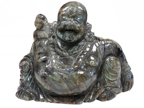 Silver blue crystal carved in shape of sitting man 