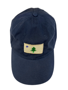 Dark blue ball cap with patch of of old Maine flag single star with a single green pine tree 