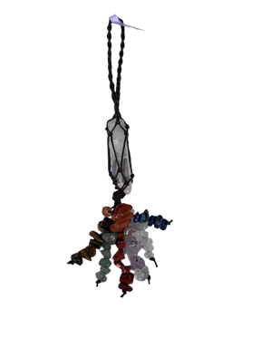 Quarts crystal point wrapped in rope with 7 strands of crystal chips in the chakra colors 
