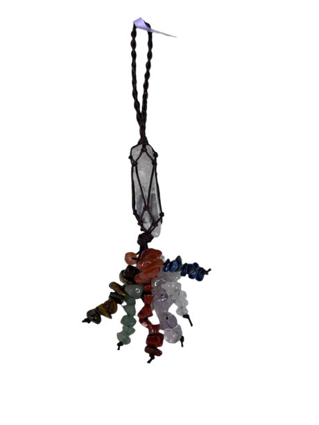 Quarts crystal point wrapped in rope with 7 strands of crystal chips in the chakra colors 
