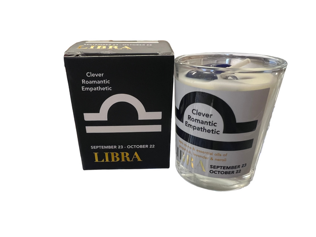 Libra Votive small white votive  candle  with lettering on label  