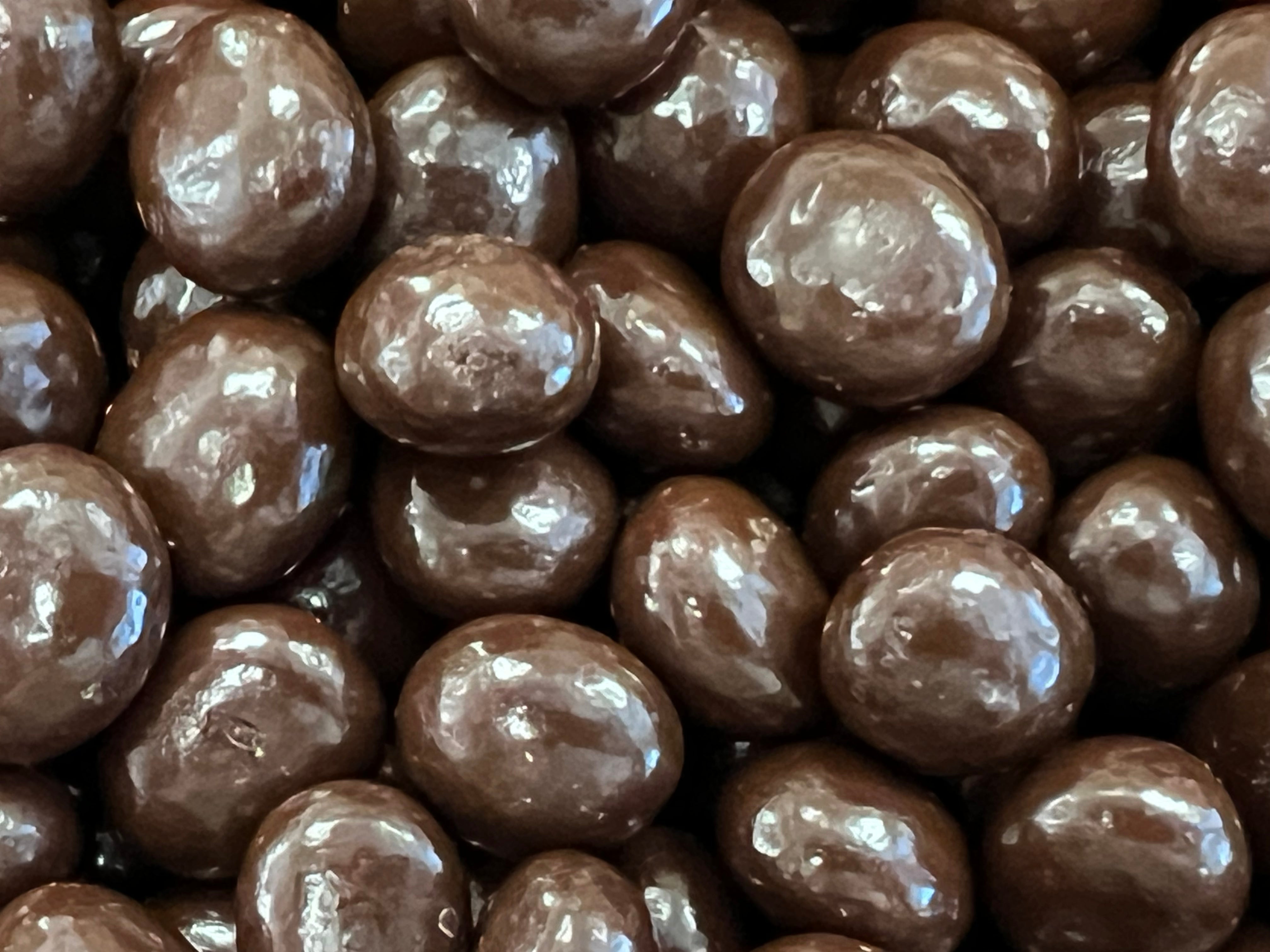 round dark chocolate covered coffeee beans 