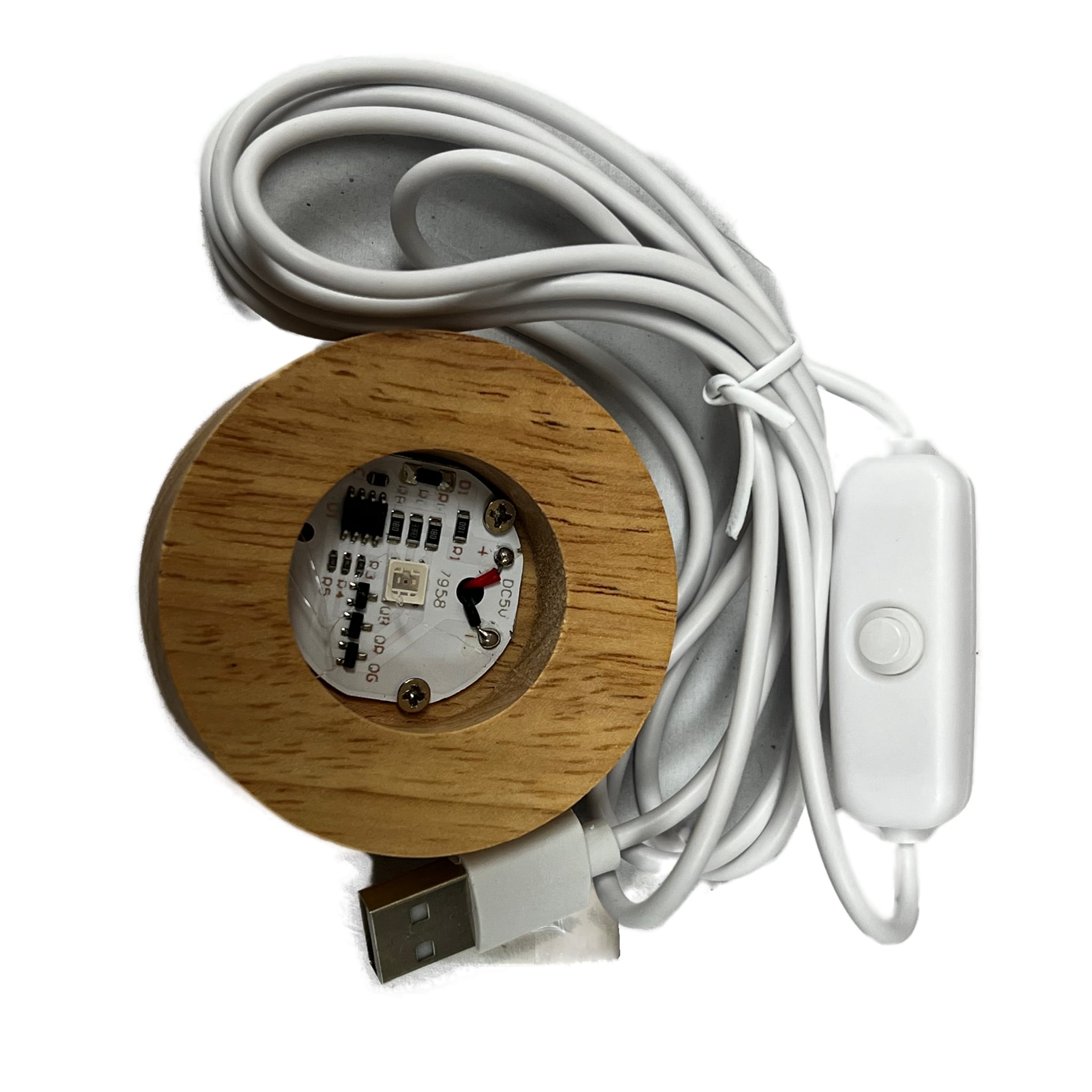 Round wood base with white power cord attached  LED light base 