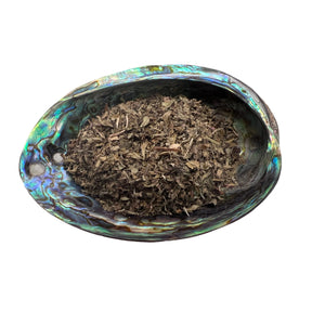 Dried Lemon Balm in an abalone shell.