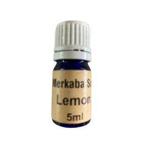 Lemon Essential Oil - Lemon Essential Oil in a small amber colored bottle with light brown label and white screw cap.