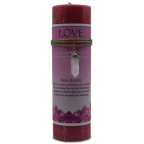 Pink candle with "LOVE" label and rose amethyst pendant.
